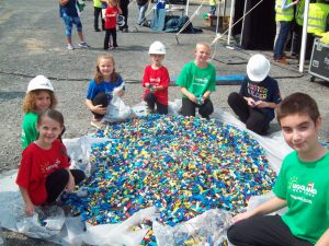 Thursday morning at the LEGOLAND New York site in Goshen, some children were on hand to help participate in the first official viewing of the Park to guests. After the program, they enjoyed time playing with the large pile of LEGOS.