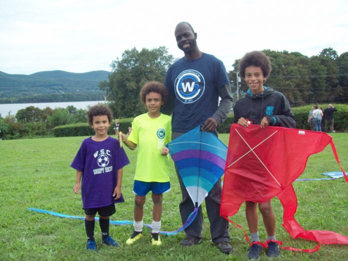 The Lewinson family from New Windsor was one of several on hand Saturday at Washington's Headquarters enjoying the annual Kites Over the Hudson event, which provided the unique opportunity to spend the afternoon outdoors flying an assortment of colorful, donated kites. From left are: Jesse, Aaron, father Orville and Isaac. Also participating in the event but not pictured was their sister as well as mother.