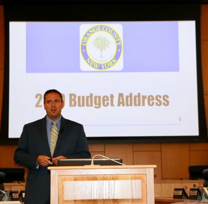 Orange County Executive Steven M. Neuhaus speaks at the 2019 budget address.