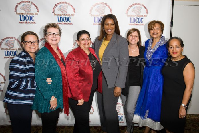 New York State Attorney General Candidate Letitia James, center, poses with members of the Latino Democratic Committee of Orange County during the organizations Fifteenth Annual Fall Dinner Dance at Cafe Internationale in Newburgh, NY on Saturday, October 13, 2018. Hudson Valley Press/CHUCK STEWART, JR.