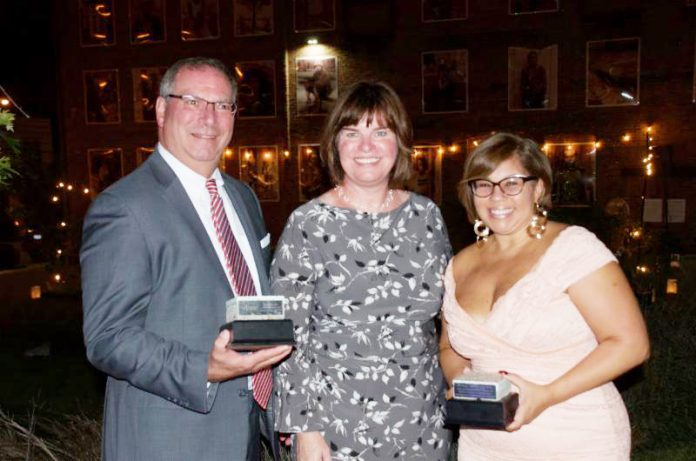 Lisa Silverstone, Executive Director, Safe Harbors of the Hudson (center) presents the Cornerstones of the Community Awards to the 2018 Honorees - Corporate Good Neighbor, Ulster Savings Bank, received by Bill Calderara, President & CEO (left); and Newburgh Champion, Maritza Calderon-Caballero (right) pose for a photo. Photo: Gina Babbage