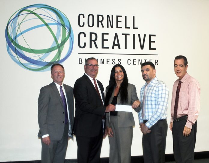 The Arc’s Cornell Creative Business Center receives $5,000 check from Ulster Savings Charitable Foundation. Pictured (from left to right) John Finch, Ulster Savings Bank EVP/COO; Bill Calderara, President and CEO, Ulster Savings Bank; Lori McCabe, Director of Communications and Public Relations, The Arc of Ulster-Greene; Christopher Veros, Director of Finance, The Arc of Ulster-Greene; and John McHugh, Executive Director, The Arc of Ulster-Greene pose for a photo.