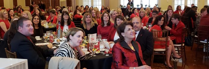 Denise Doring VanBuren, (right foreground) joined the more than 360 people, mostly women dressed in red, at The American Heart Association’s 11th Annual Go Red For Women Luncheon on Friday. The event raises awareness and funds to fight women’s number one killer - heart disease. VanBuren will serve as the event’s Chair next year.