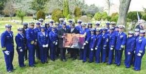 U.S. Coast Guard members past and present from around the country stand around a photograph of Dr. Olivia Hooker during her funeral service held in White Plains, New York, Dec. 5 2018. Dr. Hooker was the first African-American woman to enlist in the Coast Guard. Photo: Petty Officer 3rd Class Steve Strohmaier
