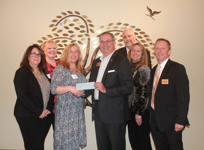 The Woodstock School of Art receives a $2,000 check from Ulster Savings Charitable Foundation. Pictured (from left to right) Kimberly Lockrow, WSA; Kelly Maroney, Sales Executive, Ulster Financial Group; Nina Doyle, Executive Director, WSA; Bill Calderara, President and CEO, Ulster Savings Bank; Christopher Rosenbergen, First VP Retail Lending and Financial Services, Ulster Savings Bank; Connie Harkin, VP Marketing, Ulster Savings Bank; and John Finch, EVP/COO, Ulster Savings Bank.