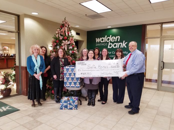 Walden Savings Bank presented a donation to Safe Homes as part of its 22 Days of Giving Campaign. Pictured from left to right are: Linda Welch, Nancy Schoen, Maryanne Weber, Jocelynne Piccolo, Safe Homes Representative - Stephanie Molinelli, Emily Ramos, Kim Gallo, Lisa Gariolo, Peter Fuchs.