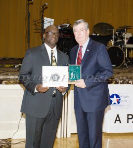 Glendon Fraser awards the Newburgh Armory Unity Center (James O'Donnell) with the Trowell-Harris Award during the 21st Annual Tuition Assistance Awards Celebration of the Major General Irene Trowell-Harris Chapter of the Tuskegee Airmen on Saturday, February 2, 2019 at Anthony's Pier 9 in New Windsor, NY. Hudson Valley Press/CHUCK STEWART, JR.
