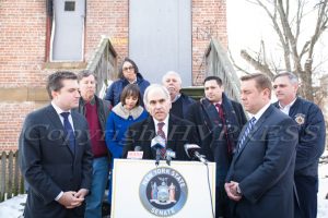 New York State Assemblyman Jonathan Jacobson (D-104) offers remarks as NY State Senator James Skoufis (D-39) holds a press conference at 197 First Street in Newburgh, NY to announce his latest investigation on Friday, March 8, 2019. Hudson Valley Press/CHUCK STEWART, JR.