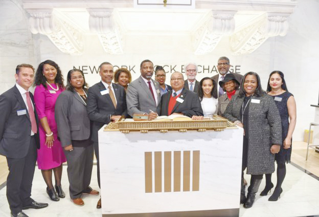 NAACP Economic Director Marvin Owens, President Derrick Johnson, Board Chairman Leon W. Russell, and NY State Conference President Hazel Dukes, lead in historic ringing of NYSE of closing bell as NAACP launches new ETF on Wall Street. Photo: Justin Knight