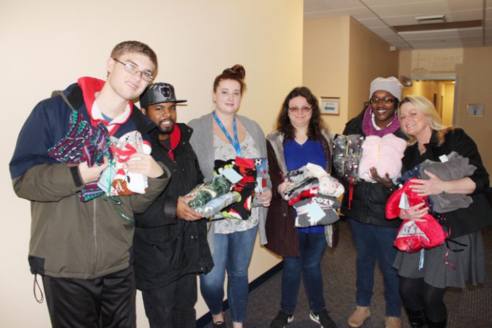Inspire shared the bounty of their annual Pajama Drive with Catholic Charities. Clients of Inspire’s Day Habilitation Program and staff delivered 100 pairs to Catholic Charities. Pictured (l-r) are Connor, Ladarius, Danielle, Inspire Direct Support Professional, Rebecca, Veronica, and Sheila Toohey, Executive Assistant, Catholic Charities, who gratefully accepted the generous donation.