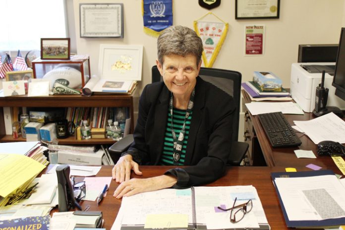 Retired NPHS Principal Barbara Clinton enjoys one of her last days on the job.