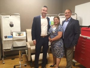 Last Tuesday night Fresenius Kidney Care officially opened at its Wappingers Falls site. From left are; Evan Smith, Director of Operations; Cindy Rodriguez, Facility Administrator; and Lane McCarthy, Regional Vice President.
