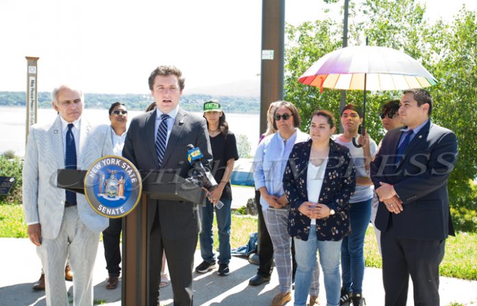 Flanked by elected officials and members of the LGBTQ community, Senator James Skoufis announced that his office secured $100,000 in operational funding for the Newburgh LGBTQ Center on Thursday, June 27, 2019. Hudson Valley Press/CHUCK STEWART, JR.