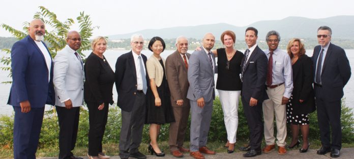 Mr. Raul Rodriguez, Co-Principal, NFA Main Campus; Mr. Phillip Howard, NECSD Board member; Beverly Keefer, Director of Cardiovascular Services; Dr. Mark Greenberg, Dr. Ying Yang,Dr. Munir Shikari, Dr. Roberto Padilla, NECSD Superintendent; Joan Cusack-McGuirk, MSLC President and CEO; Dr. Anthony Patrello, Medical Director, Cardiovascular Institute at MSLC; Dr. Harshan Weerackody; Margaret Deyo-Allers, MSLC Chief Nursing Officer and Vice President of Patient Care Services; and Mr. Matteo Doddo, Co-Principal, NFA North Campus pose for a photo.
