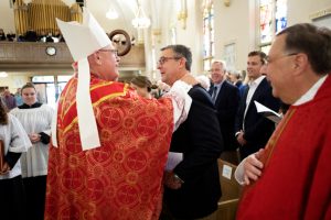 Cardinal Timothy Dolan (left) concelebrated the inauguration Mass for Dr. Jason N. Adsit (right), seventh president of Mount Saint Mary College.  Photo: Lee Ferris