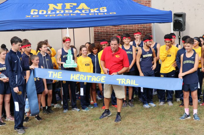 Heritage Middle School unveiled a newly cleared path donated by Newburgh Free Academy alumnus Lynn Warren, class of 1984. The path will primarily be used by the NFA cross-country team for practice and meets.