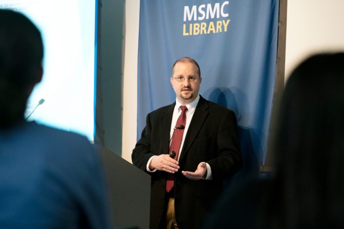 Michael L. Fox, assistant professor of Business Law and the college’s Pre-Law advisor at Mount Saint Mary College, discusses human rights laws at his recent talk. Photo: Lee Ferris