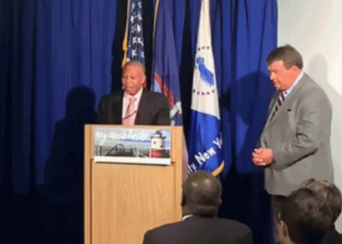 Board of Legislators’ Chairman Benjamin Boykin, left, discusses county’s 2020 budget as just introduced by County Executive George Latimer, right.