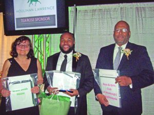 Honorees display the certificates of appreciation they were awarded with at Saturday’s event at Eisenhower Hall Theater, West Point. From left are: Branka Bryan, Executive Director of the Grace Smith House in Poughkeepsie; Brandon Walker, Chef and Owner of Essie’s Restaurant in Poughkeepsie and Kevin White, Executive Director of the Boys & Girls Club in Newburgh-Poughkeepsie.