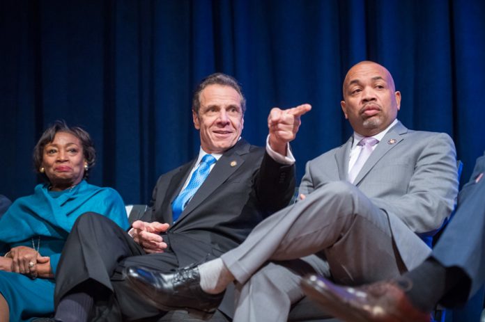 New York State Senate Majority Leader Andrea Stewart-Cousins, Governor Andrew Cuomo and Speaker Carl E. Heastie share a moment during the 2020 State of the State address.