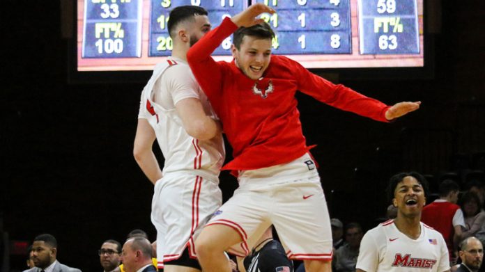 Tyler Sagl and Ryan Carmello celebrate after their 83-73 home victory over Iona.