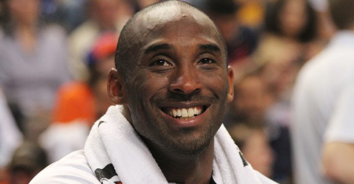 Kobe Bryant on sidelines with TEAM USA, the United States Olympic basketball team, in Manchester, England, July 2012. Photo: Christopher Johnson / Wikimedia Commons