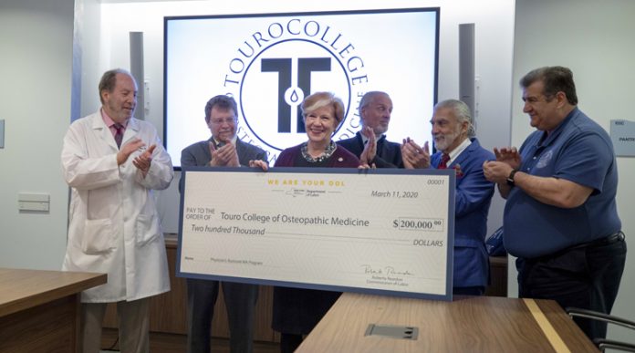 New York State Department of Labor Commissioner Roberta Reardon presented a $200,000 award to Touro College of Osteopathic Medicine.
