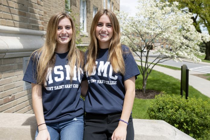 Twins Eleni (left) and Stefanie Drautz of East Northport, N.Y. graduated from Mount Saint Mary College this May. Photo: Lee Ferris