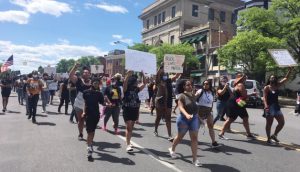 Protestors for racial justice walk down Broadway in the City of Newburgh Sunday afternoon.