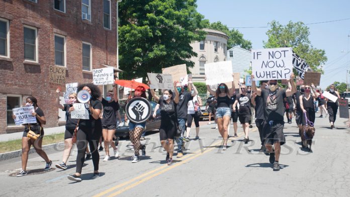 People gathered in Downing Park to speak out about systemic racism and the need for change on all levels before marching to city hall on July 4, 2020. Hudson Valley Press/CHUCK STEWART, JR.