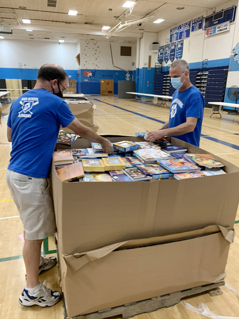 Wallkill Teachers unpack almost 40,000 books to distribute to students.