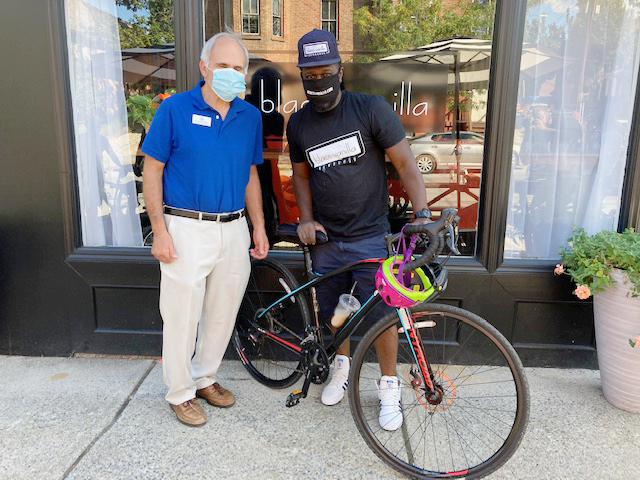 Assemblyman, Jonathan Jacobson stands with blacc vanilla cafe owner, Jarrod Lang, at Saturday’s Second Annual Bike Giveaway.