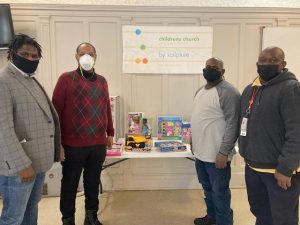 Four members, representing the Hebron Lodge in the City of Beacon, turned out Saturday afternoon at the Star of Bethlehem Baptist Church on Main Street in Beacon to provide six families with baskets of toys and food to prepare a dinner for the upcoming holiday. From left are; Junior Warden Herbert Bullock, Worshipful Master Aubrey Mitchell, Senior Warden Jeffrey Jackson and Secretary Harold Miller.