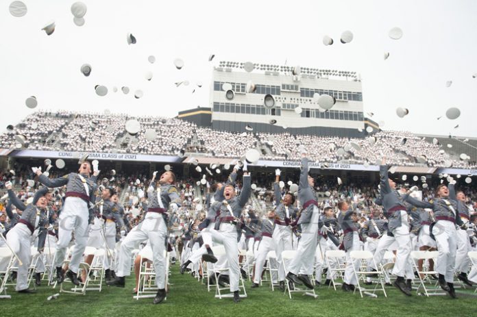 Cadets toss their hats following the United States Military Academy Class of 2021 graduation and commissioning ceremony held on Saturday, May 22, 2021 in West Point's Michie Stadium. Hudson Valley Press/CHUCK STEWART, JR.