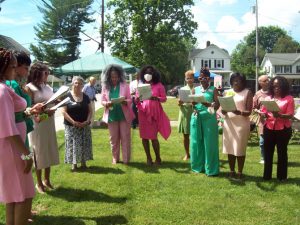 Members of the Alpha Kappa Alpha Sorority, Incorporated perform the Alpha Kappa Alpha Hymn following the official unveiling of the Harriet Josephine Terry Historical Marker Thursday afternoon. Terry, in addition to being a long-term educator, songwriter and community leader, was also one of the original founders of Alpha Kappa Alpha Sorority.
