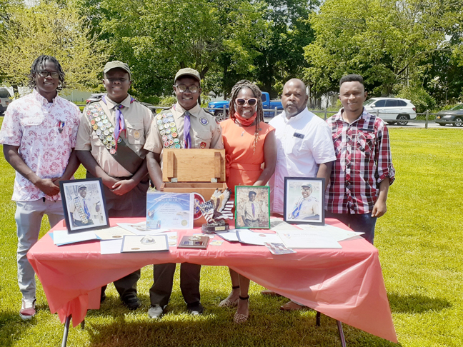Pictured above: Brandon A. Gibbs (brother), Eagle Scout, Chad A. Gibbs (brother), Life Scout, Cody A. Gibbs, Eagle Scout, Nyhisha T. Gibbs, Mom, Robert Gibbs, Dad and Devin A. Gibbs (brother).