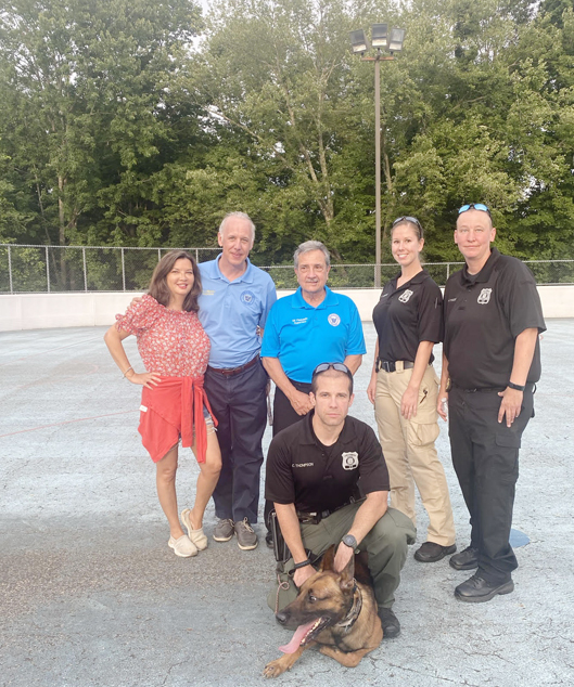 (Standing in back, L-R): Attorney Juliana LoBiondo; Town Councilman Anthony LoBiondo, Town Supervisor Gil Piaquadio, Town of Newburgh Police Officers; In front: Town of Newburgh Police Officer C. Thompson and K-9 police dog Durak pose for a photo. Photo: Town of Newburgh