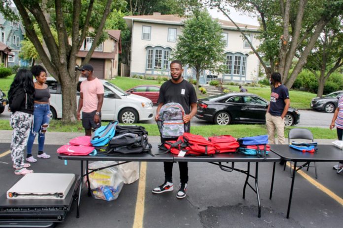 Dozens of children in the City of Poughkeepsie received school supplies thanks to corporate and private donors on Sunday. The “giveaway” was hosted by County Legislator Barrington Atkins at the Firemen’s Exempt on Mansion Street.