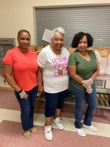 City of Poughkeepsie resident, Doris Brown (middle) retired earlier this year in January after 38 years of dedicated work from her position as Servant Leader at the Soup Kitchen at the Beulah Baptist Church in the City of Poughkeepsie. On her left, is Deborah Bush and to her right is Desiree Williams, both volunteers at the Soup Kitchen. The trio of women had just returned from picking up food for a recent Soup Kitchen event. Brown, although retired, continues to periodically check in on the Soup Kitchen, a special place. full of fond memories, which will forever hold a place in her heart.