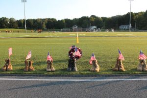 Military boots representing the 13 soldiers who were killed in the Kabul airport attack in Afghanistan were part of the Marlboro High School ceremony honoring active and retired military, held on September 11.