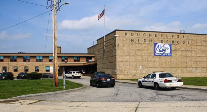 Marked and unmarked police vehicles at Poughkeepsie High School due to A threat circulating on social media saying “Don’t come to school Sept. 22” turned out to be something of a hoax Wednesday at Poughkeepsie High School.