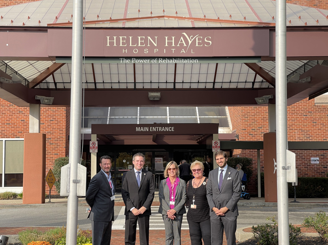 From the left to right: CEO Edmond Coletti, Senator Skoufis, Chief Nursing Officer Yvonne Evans, COO Kathleen Martucci, and Senator Gounardes in front of Helen Hayes Hospital.