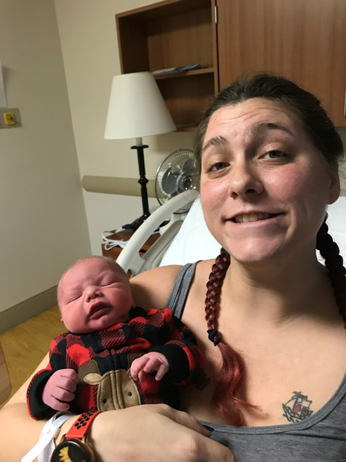 Sara Van Leuven with her baby boy Timothy Michael Dolan, Jr.