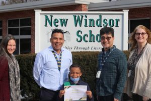 Students were charged with creating a poster to promote bus safety. Of the submissions, Zyir Coleman, grade 2, moved on to the NYS competition and won First Place for his art. Photo Credit: Mr. Lee