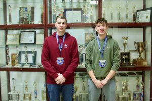 Ulster BOCES Aviation/Drone students Joe Carpino, Kingston City School District (l); and Dalton Veeder, New Paltz Central School District (r); proudly display the first place medals they won in the Federal Aviation Administration STEM Aviation and Space Education Airport Design Challenge. The duo, who were part of a team of five dubbed the “Straw Hat Pilots,” competed against more than 3,000 students from 50 states and 18 different countries.