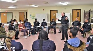 Dutchess County Sheriff’s Office Deputy Alonzo Montanya discusses his personal story with Poughkeepsie High School students in the Youth and Police Initiative during a training session on March 23rd.