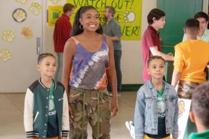 Christian Cote as Bailey, Gabrielle Union as Zoey Baker, and Sebastian Cote as Bronx in 20th Century Studios' CHEAPER BY THE DOZEN. Photo by Merrick Morton. © 2022 20th Century Studios. All Rights Reserved.