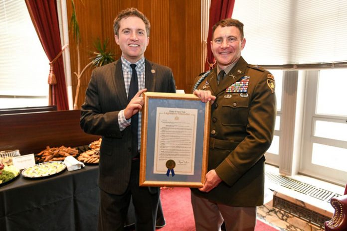 Senator Skoufis presents Col. Kwenton Kuhlman, Director of the Simon Center for the Professional Military Ethic, with the Senate’s resolution celebrating West Point Day.