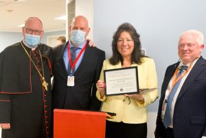 His Eminence Timothy Michael Cardinal Dolan, Executive Director at ArchCare at Ferncliff Michael Deyo, State Senator Sue Serino, and President and CEO of ArchCare Scott LaRue, after Senator Serino presented a Certificate of Recognition at the Center’s ribbon cutting ceremony.