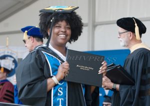 Ashley Monet Harley of Newburgh, NY receives her diploma as Mount Saint Mary College recognized more than 500 graduates at its 59th annual Commencement Ceremony on Saturday, May 21, 2022. Hudson Valley Press/CHUCK STEWART, JR.